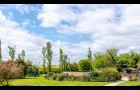 Deux maisons de charme, une grange, un étang sur 1,30 Hectares à la campagne